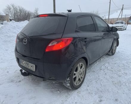 Чорний Мазда 2, об'ємом двигуна 1.4 л та пробігом 237 тис. км за 1777 $, фото 1 на Automoto.ua