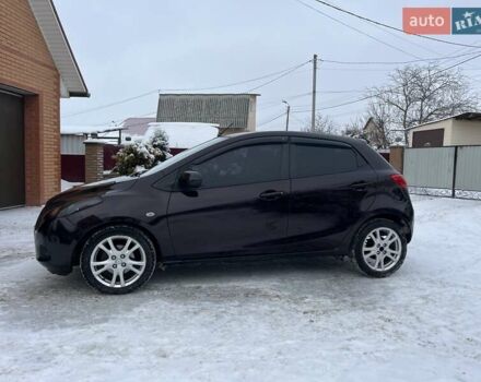 Фиолетовый Мазда 2, объемом двигателя 1.5 л и пробегом 221 тыс. км за 5650 $, фото 1 на Automoto.ua