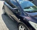Коричневый Мазда 2, объемом двигателя 1.5 л и пробегом 141 тыс. км за 6600 $, фото 1 на Automoto.ua