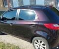 Коричневий Мазда 2, об'ємом двигуна 1.5 л та пробігом 126 тис. км за 6700 $, фото 1 на Automoto.ua