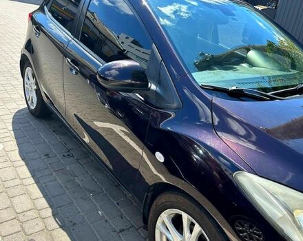 Коричневый Мазда 2, объемом двигателя 1.5 л и пробегом 141 тыс. км за 6600 $, фото 2 на Automoto.ua