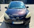 Коричневый Мазда 2, объемом двигателя 1.5 л и пробегом 141 тыс. км за 6600 $, фото 1 на Automoto.ua