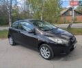 Коричневый Мазда 2, объемом двигателя 1.35 л и пробегом 226 тыс. км за 5200 $, фото 1 на Automoto.ua