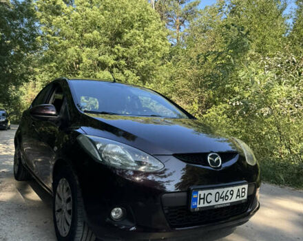 Коричневый Мазда 2, объемом двигателя 1.4 л и пробегом 249 тыс. км за 5200 $, фото 1 на Automoto.ua