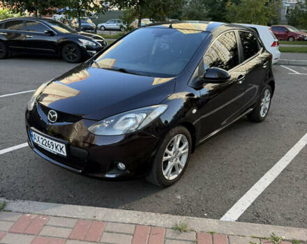 Коричневий Мазда 2, об'ємом двигуна 1.5 л та пробігом 142 тис. км за 6950 $, фото 1 на Automoto.ua