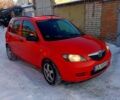 Красный Мазда 2, объемом двигателя 1.2 л и пробегом 160 тыс. км за 4000 $, фото 1 на Automoto.ua