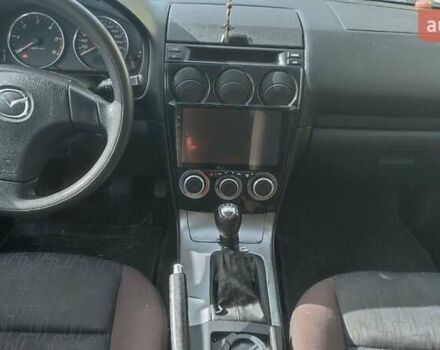 Красный Мазда 2, объемом двигателя 2 л и пробегом 265 тыс. км за 3650 $, фото 3 на Automoto.ua