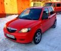 Червоний Мазда 2, об'ємом двигуна 1.2 л та пробігом 160 тис. км за 4000 $, фото 4 на Automoto.ua
