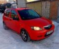 Красный Мазда 2, объемом двигателя 1.25 л и пробегом 160 тыс. км за 4500 $, фото 1 на Automoto.ua