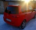Красный Мазда 2, объемом двигателя 1.2 л и пробегом 160 тыс. км за 4000 $, фото 1 на Automoto.ua