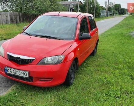 Червоний Мазда 2, об'ємом двигуна 1.2 л та пробігом 329 тис. км за 1850 $, фото 2 на Automoto.ua
