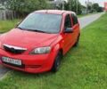 Червоний Мазда 2, об'ємом двигуна 1.2 л та пробігом 329 тис. км за 1850 $, фото 2 на Automoto.ua