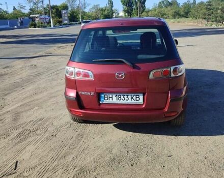 Красный Мазда 2, объемом двигателя 1.4 л и пробегом 178 тыс. км за 3800 $, фото 12 на Automoto.ua