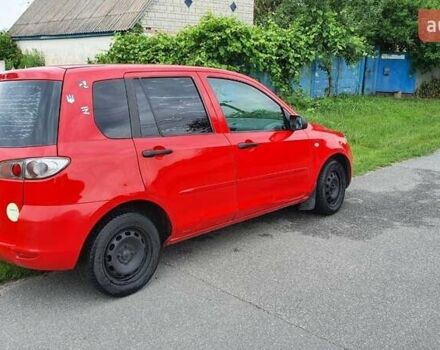 Червоний Мазда 2, об'ємом двигуна 1.2 л та пробігом 329 тис. км за 1850 $, фото 3 на Automoto.ua