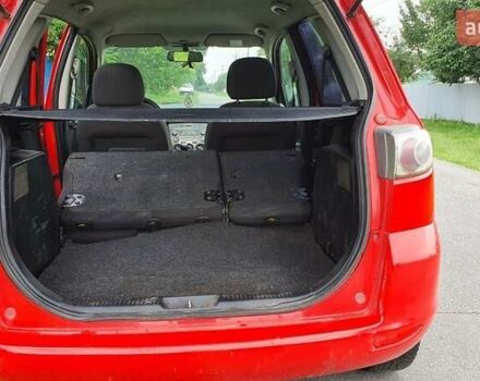 Червоний Мазда 2, об'ємом двигуна 1.2 л та пробігом 329 тис. км за 1850 $, фото 6 на Automoto.ua