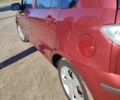 Красный Мазда 2, объемом двигателя 1.4 л и пробегом 178 тыс. км за 3800 $, фото 3 на Automoto.ua