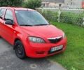 Червоний Мазда 2, об'ємом двигуна 1.2 л та пробігом 329 тис. км за 1850 $, фото 1 на Automoto.ua