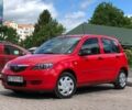 Красный Мазда 2, объемом двигателя 1.3 л и пробегом 110 тыс. км за 4500 $, фото 1 на Automoto.ua
