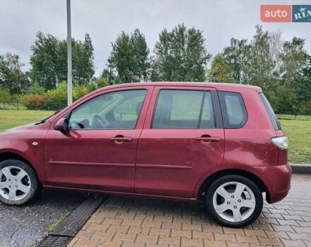 Червоний Мазда 2, об'ємом двигуна 1.4 л та пробігом 170 тис. км за 4200 $, фото 5 на Automoto.ua