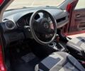 Червоний Мазда 2, об'ємом двигуна 1.4 л та пробігом 299 тис. км за 3600 $, фото 10 на Automoto.ua
