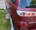 Красный Мазда 2, объемом двигателя 1.4 л и пробегом 305 тыс. км за 3600 $, фото 7 на Automoto.ua