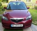 Красный Мазда 2, объемом двигателя 1.4 л и пробегом 305 тыс. км за 3600 $, фото 12 на Automoto.ua