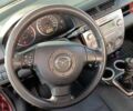Красный Мазда 2, объемом двигателя 1.4 л и пробегом 305 тыс. км за 3600 $, фото 33 на Automoto.ua