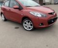 Червоний Мазда 2, об'ємом двигуна 1.4 л та пробігом 175 тис. км за 5400 $, фото 1 на Automoto.ua