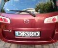 Красный Мазда 2, объемом двигателя 1.4 л и пробегом 305 тыс. км за 3600 $, фото 17 на Automoto.ua