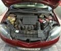 Красный Мазда 2, объемом двигателя 1.4 л и пробегом 305 тыс. км за 3600 $, фото 24 на Automoto.ua