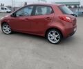 Червоний Мазда 2, об'ємом двигуна 1.4 л та пробігом 175 тис. км за 5400 $, фото 1 на Automoto.ua