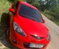 Червоний Мазда 2, об'ємом двигуна 1 л та пробігом 292 тис. км за 6450 $, фото 3 на Automoto.ua