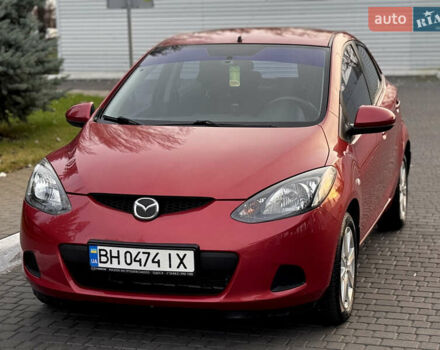 Червоний Мазда 2, об'ємом двигуна 1.5 л та пробігом 138 тис. км за 6800 $, фото 3 на Automoto.ua