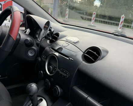 Красный Мазда 2, объемом двигателя 1.5 л и пробегом 208 тыс. км за 6200 $, фото 7 на Automoto.ua