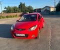 Червоний Мазда 2, об'ємом двигуна 1.4 л та пробігом 223 тис. км за 3300 $, фото 1 на Automoto.ua