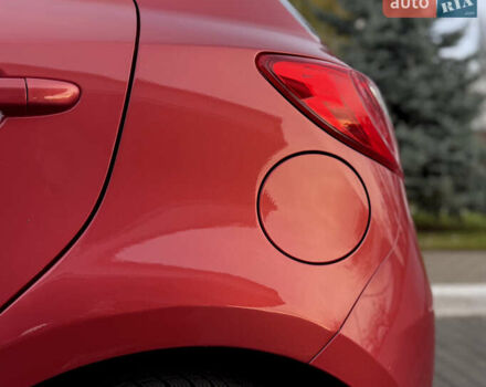 Червоний Мазда 2, об'ємом двигуна 1.5 л та пробігом 138 тис. км за 6800 $, фото 13 на Automoto.ua