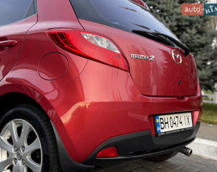 Червоний Мазда 2, об'ємом двигуна 1.5 л та пробігом 138 тис. км за 6800 $, фото 6 на Automoto.ua