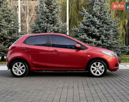 Червоний Мазда 2, об'ємом двигуна 1.5 л та пробігом 138 тис. км за 6800 $, фото 7 на Automoto.ua