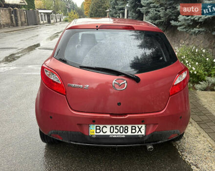 Красный Мазда 2, объемом двигателя 1.5 л и пробегом 109 тыс. км за 7100 $, фото 4 на Automoto.ua