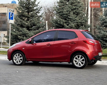 Червоний Мазда 2, об'ємом двигуна 1.5 л та пробігом 138 тис. км за 6800 $, фото 2 на Automoto.ua