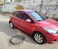 Красный Мазда 2, объемом двигателя 1.5 л и пробегом 138 тыс. км за 6500 $, фото 1 на Automoto.ua