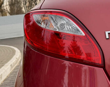 Червоний Мазда 2, об'ємом двигуна 1.5 л та пробігом 138 тис. км за 6800 $, фото 32 на Automoto.ua