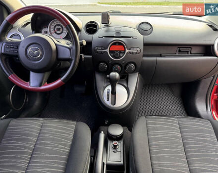 Червоний Мазда 2, об'ємом двигуна 1.5 л та пробігом 138 тис. км за 6800 $, фото 46 на Automoto.ua
