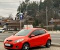 Червоний Мазда 2, об'ємом двигуна 1 л та пробігом 292 тис. км за 6450 $, фото 1 на Automoto.ua