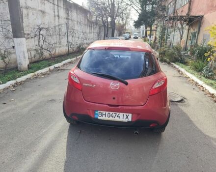 Красный Мазда 2, объемом двигателя 1.5 л и пробегом 138 тыс. км за 6500 $, фото 2 на Automoto.ua