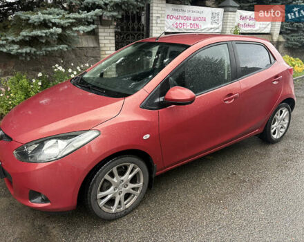 Красный Мазда 2, объемом двигателя 1.5 л и пробегом 109 тыс. км за 7100 $, фото 2 на Automoto.ua