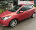 Красный Мазда 2, объемом двигателя 1.5 л и пробегом 109 тыс. км за 7100 $, фото 2 на Automoto.ua