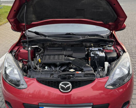 Червоний Мазда 2, об'ємом двигуна 1.5 л та пробігом 138 тис. км за 6800 $, фото 47 на Automoto.ua