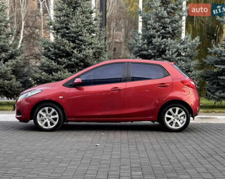 Червоний Мазда 2, об'ємом двигуна 1.5 л та пробігом 138 тис. км за 6800 $, фото 12 на Automoto.ua