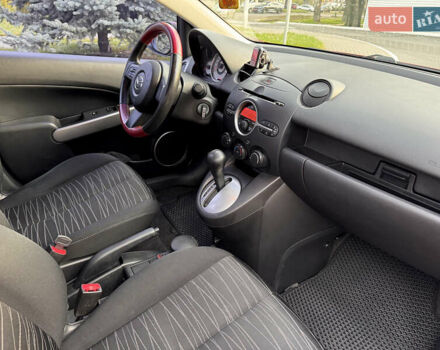 Червоний Мазда 2, об'ємом двигуна 1.5 л та пробігом 138 тис. км за 6800 $, фото 42 на Automoto.ua